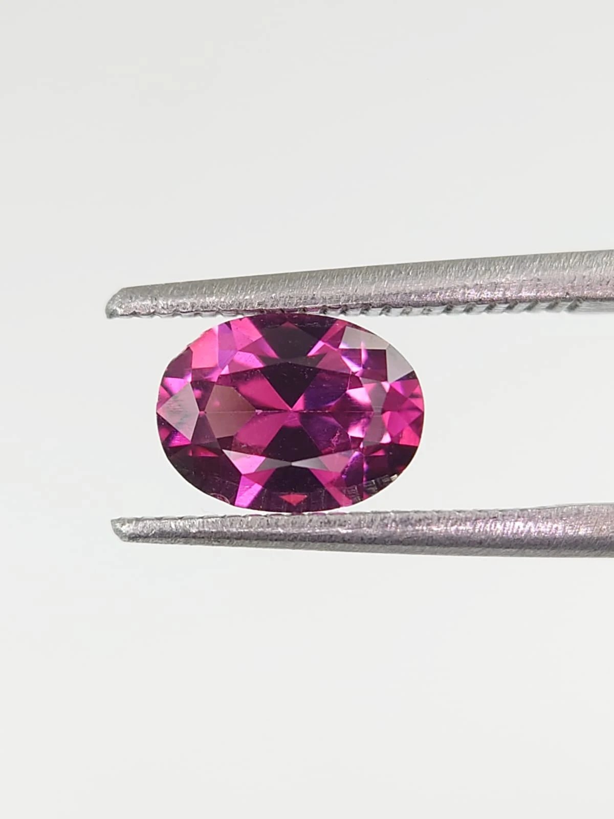 1.46ct Natural Malaya Garnet Oval Cur From Tanzania — view 2